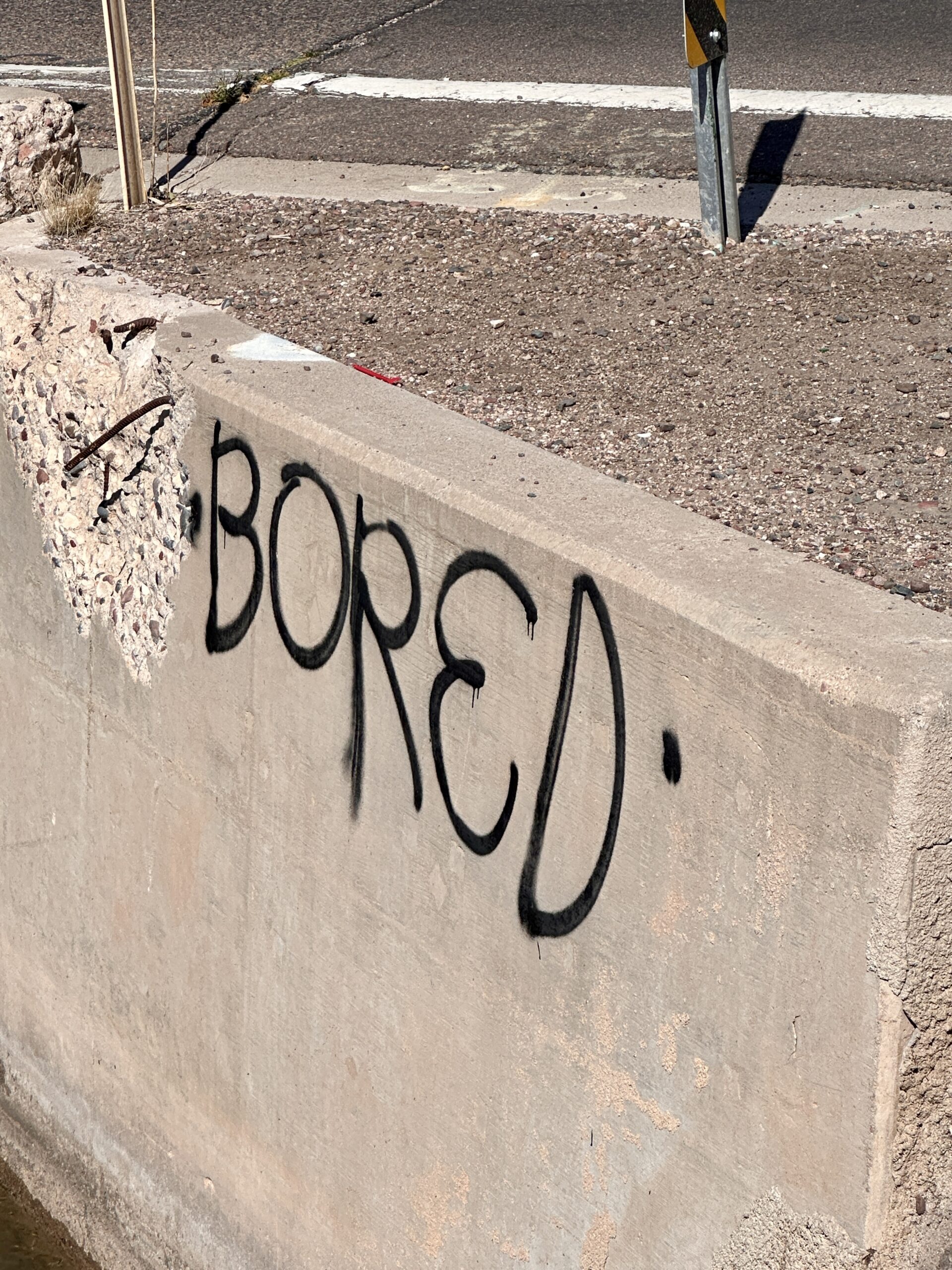 Grafiti on an overpass, Bored